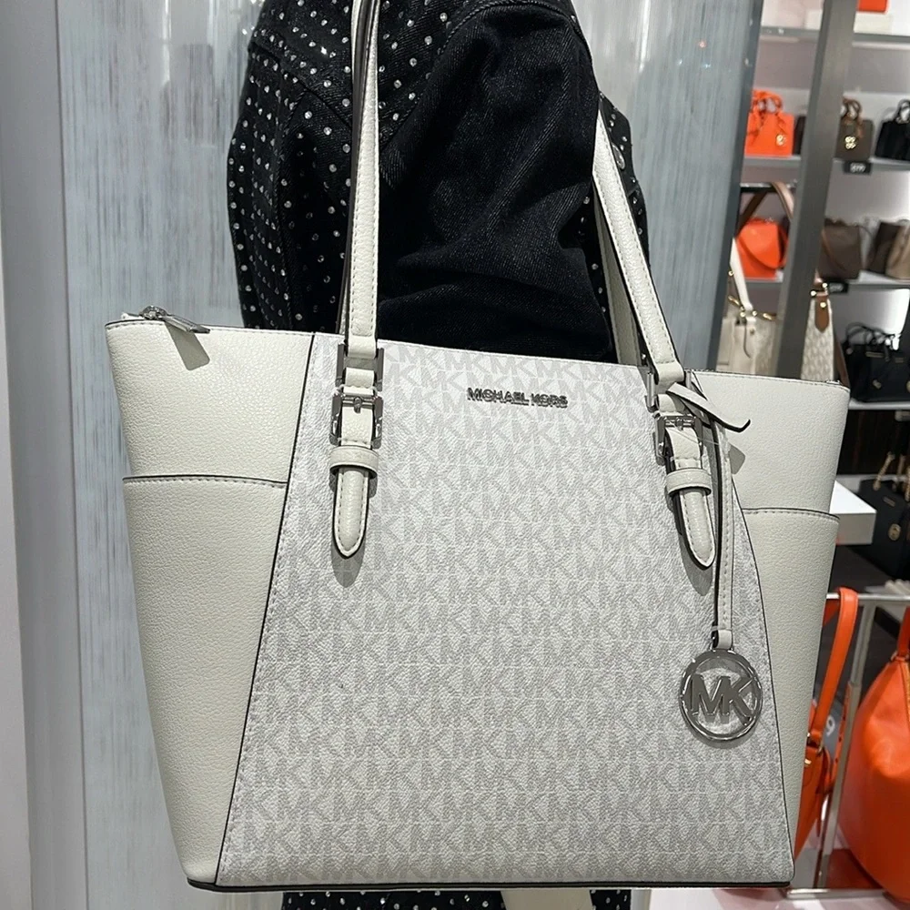 Michael Kors Charlotte Large Logo and Leather Top-Zip Tote Bag
Optic White
NWT - Picture 14 of 16